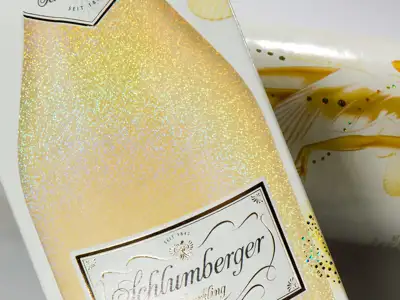 Sparkling wine cardboard with hologram effect transparent to simulate the rising bubbles in sparkling wine