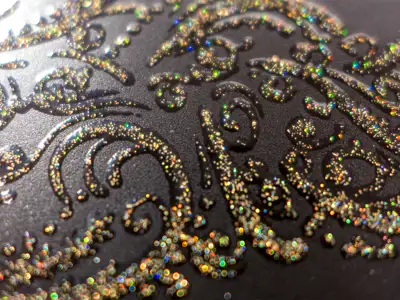 Tastbarer Glitterlack Hologrammgold in Siebdruckqualität auf Papier