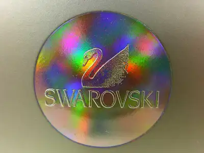 Hologrammeffekt mit Mikroprägung in Siegelform