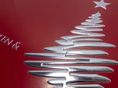 Folienprägung Silber echtmetallisch glänzend mit Relief für eine Weihnachtskarte