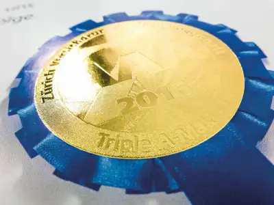 Goldsiegel in Medaillen-Form bei einer Auszeichnung